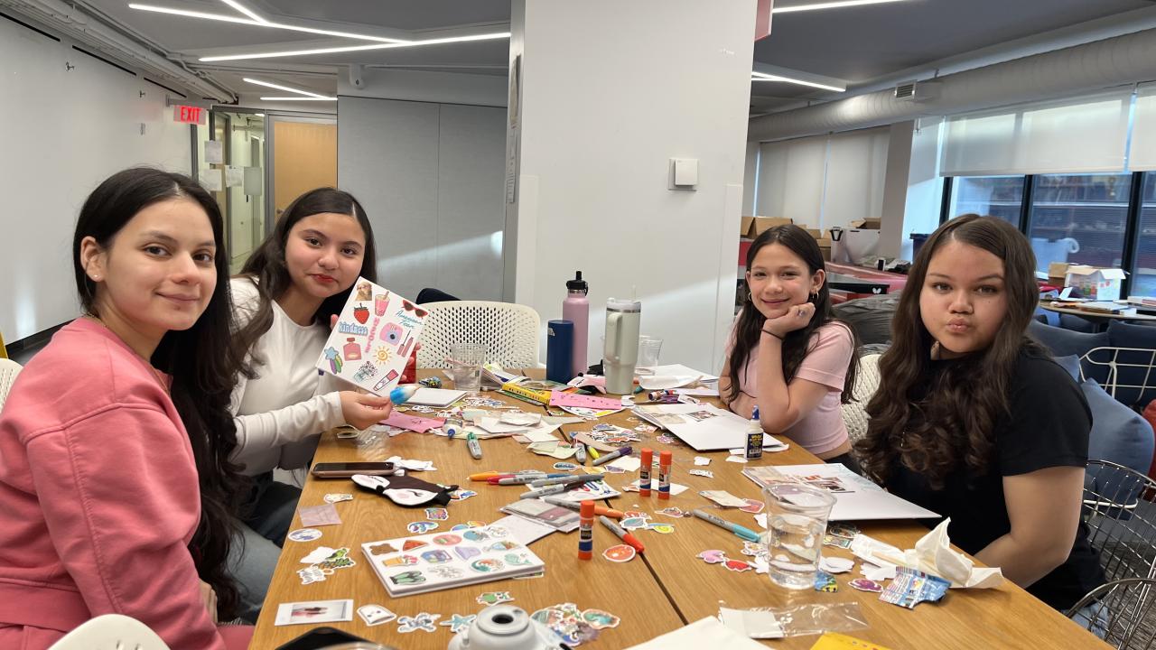 Decorating journals during Arts & Crafts.